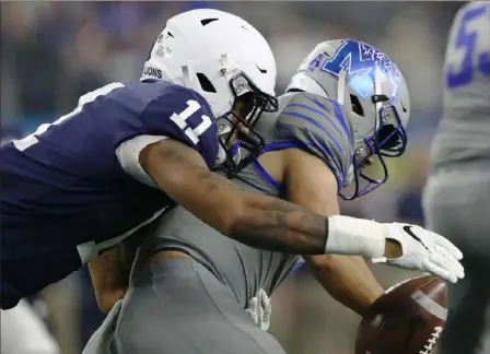  ?? Ronald Martinez/Getty Images ?? Penn State’s Micah Parsons is one of the few players who had a first-round grade last summer and maintained it through a 2020 season that he did not play.