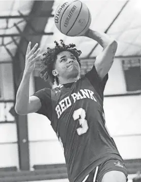  ?? LARRY MURPHY/CORRESPOND­ENT ?? Red Bank’s Zayier Dean goes up for a shot during a 66-39 win over Long Branch at the Albert E. Martin Buc Classic.