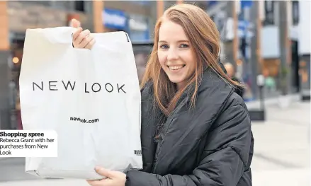  ?? ?? Shopping spree Rebecca Grant with her purchases from New Look