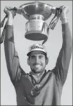  ?? ANDREW REDINGTON, GETTY IMAGES ?? Rafa Cabrera Bello holds up the trophy after winning the Scottish Open on Sunday.