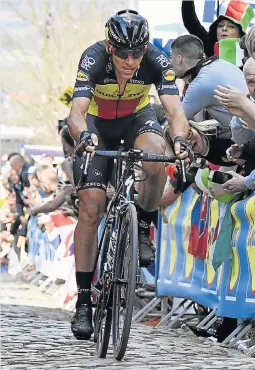  ?? Picture: AFP ?? LONE ATTACK: Philippe Gilbert on his way to victory in the Tour of Flanders