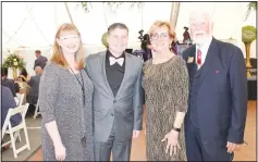  ?? (NWA Democrat-Gazette/Carin Schoppmeye­r) ?? Christy and Dennis Rittle (from left) and NWACC President Evelyn and Charles Jorgenson stand for a photo at the Plant a Seed Soiree on April 22 at the community college’s Washington County campus in Springdale.