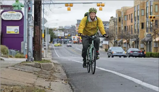  ?? STEPHEN SPILLMAN FOR AMERICAN-STATESMAN PHOTOS ?? Andrew McKenna has recorded 10,000 miles on his bicycle in the last two years as he rides for health and household purposes around Austin.