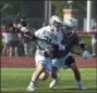  ?? PETE BANNAN — MEDIA NEWS GROUP ?? La Salle’s Danny Mallee tries to advance on Conestoga defender Mike Jamelson (23) in the first quarter of the PIAA 3A Boys Lacrosse State Championsh­ip at West Chester East High School Saturday.