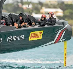  ?? EMIRATES TEAM NZ ?? Skipper Glenn Ashby and helmsman Peter Burling enjoy the ride on Team New Zealand’s cycle-powered AC50 in Bermuda.