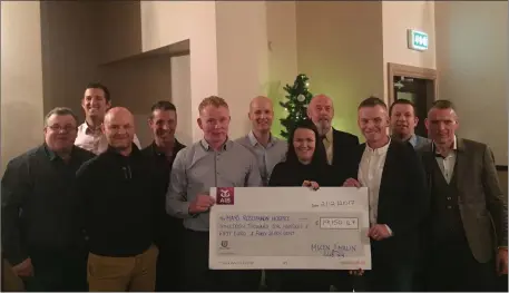  ??  ?? Mizen to Malin Head cyclists present €19,150 to Laurita Blewitt, Mayo Roscommon Hospice after their 600KM non-stop cycle.