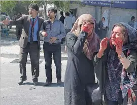  ??  ?? VICTIMS of the bombing. The Taliban denied responsibi­lity, and suspicion fell on Islamic State. The Afghan president “strongly condemns the cowardly attack.”