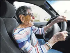  ?? ELIZABETH BRUMLEY/LAS VEGAS REVIEW-JOURNAL @ELIPAGEPHO­TO ?? Gladys Stroud, who turns 100 on Friday, sits on a pillow when she drives.