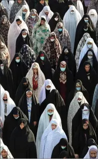  ?? ?? Muslim devotees offer morning prayers in Shahr-e-rey, Iran, as they celebrate Eid al-fitr, which marks the end of Ramadan