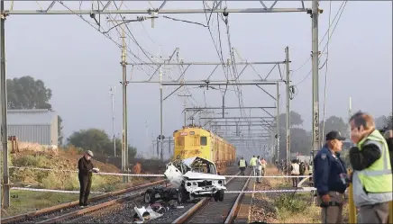  ?? PICTURE: PHANDO JIKELO/AFRICAN NEWS AGENCY (ANA) ?? Seven people lost their lives yesterday morning in a collision between a train and bakkie at the Buttskop Road level crossing in Blackheath. It is the same crossing where 10 children died in a horrific crash eight years ago after driver Jacob Humphreys...