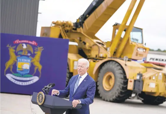  ?? EVAN VUCCI/AP ?? President Joe Biden delivers remarks on his Build Back Better agenda Tuesday during a visit to the Internatio­nal Union Of Operating Engineers Local 324 in Howell, Michigan.