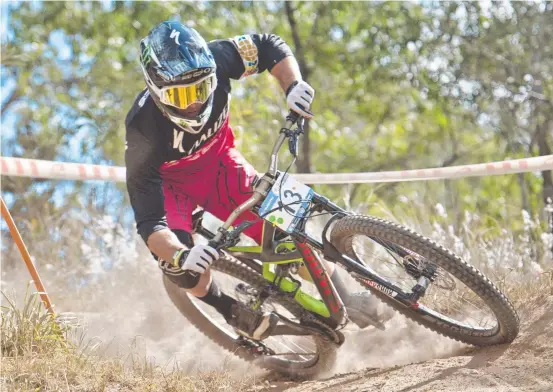  ?? Picture: Nev Madsen ?? OLYMPIC STAR: Jared Graves takes second place in the 2016 Men’s DHI final at the Subaru National Mountain Bike Series in Toowoomba. Graves placed sixth in the BMX final of the 2008 Beijing Olympics after crash created by another rider ruined his shot at gold.