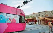  ?? [PHOTO BY BRYAN TERRY, THE OKLAHOMAN] ?? A streetcar moves east on Sheridan Avenue toward Bricktown during a recent system test.