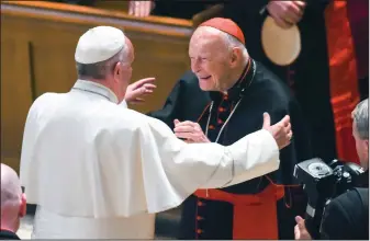  ?? Jonathan Newton/The Washington Post via AP, Pool, File ?? Greetings: In this Sept. 23, 2015 file photo, Pope Francis reaches out to hug Cardinal Archbishop emeritus Theodore McCarrick after the Midday Prayer of the Divine with more than 300 U.S. Bishops at the Cathedral of St. Matthew the Apostle in Washington. Seton Hall University has begun an investigat­ion into potential sexual abuse at two seminaries it hosts following misconduct allegation­s against ex-Cardinal McCarrick and other priests.