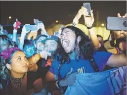  ??  ?? A JUBILANT FAN lets it all out as RL Grime takes the stage at Arts District event, presented by former Hard Summer mastermind Gary Richards.