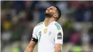  ?? ?? Riyad Mahrez wasted an opportunit­y to get Algeria back into the match when his spot-kick hit the post