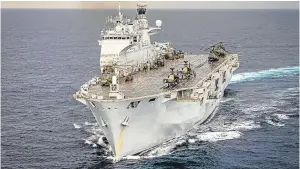  ??  ?? HMS Ocean, which is carrying 60 tonnes of aid to the area.
