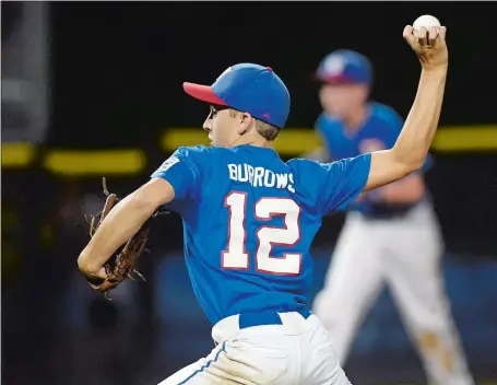  ?? SEAN D. ELLIOT/THE DAY ?? Waterford pitcher Jared Burrows prepares to throw a knucklebal­l during Monday’s 3-2 victory over Cranston Western (R.I.) in the opening round of the Little League Baseball New England Regional tournament in Bristol. Burrows went the distance and...