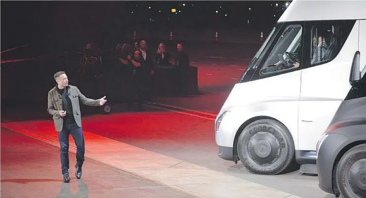  ?? — GETTY IMAGES FILES ?? Tesla Chairman and CEO Elon Musk unveils the new Semi electric truck to buyers and journalist­s. David Booth contests its performanc­e claims.