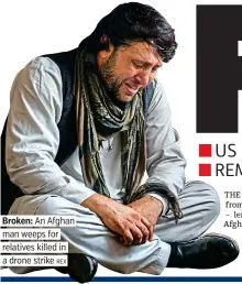  ?? REX ?? Broken: An Afghan man weeps for relatives killed in a drone strike