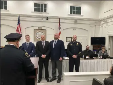  ?? BRYSON DURST — THE NEWS-HERALD ?? Members of the Painesvill­e Police Detective Bureau are honored with a unit citation at the Feb. 6Painesvil­le City Council meeting.