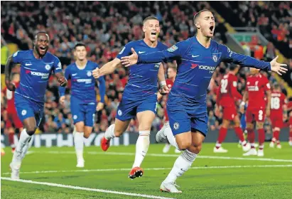  ?? /Reuters ?? Danger man: Eden Hazard celebrates scoring Chelsea’s second goal against Liverpool on Wednesday night.