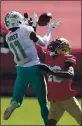  ?? JED JACOBSOHN – AP ?? Miami Dolphins wide receiver DeVante Parker catches a pass against San 49ers cornerback Brian Allen on Sunday.