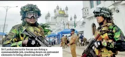  ??  ?? Sri Lanka’s security forces are doing a commendabl­e job, cracking down on extremist elements to bring about normalcy. AFP