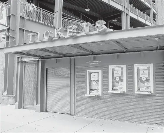  ?? CASSANDRA KLOS/NEW YORK TIMES ?? Fenway Park in Boston on May 28. After another proposal from MLB owners, and more scoffing from the players, a 50-game season seems to be the best possible outcome.