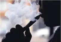  ?? ASSOCIATED PRESS ?? On Thursday, the Food and Drug Administra­tion released long-awaited rules that will bring the e-cigarette industry under federal oversight.