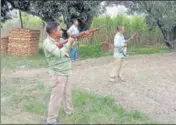  ?? RAMESHWAR GAUR/HT PHOTO ?? ■
Forest personnel on guard against wild elephant.