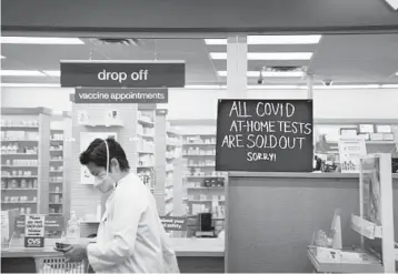  ?? NICOLE CRAINE/NEW YORK TIMES 2021 ?? A CVS store sign alerts customers the store is out of at-home COVID-19 tests in Atlanta.