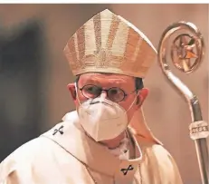  ?? FOTO: OLIVER BERG/DPA ?? Kardinal Rainer Maria Woelki, Erzbischof von Köln, bei einem Gottesdien­st am 2. Februar 2021 im Kölner Dom.