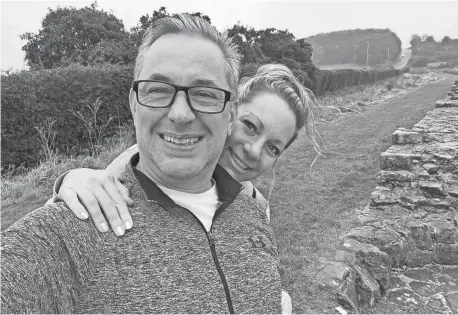  ?? PROVIDED BY ANDREW KERNAHAN ?? Andrew Kernahan and his wife, Abby, stand on Hadrian’s Wall in Heddon-on-the-Wall, a village in England where Kernahan grew up, in September. He is the chief engineer of the Ford Super Duty truck program.