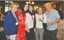  ??  ?? From left, Sheila Crisp, Jane Coates, Kristin Ference, Nancy Skaggs and Terry Crisp, former Calgary Flames head coach.