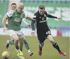  ??  ?? 0 Callum Mcgregor, right, battles with Alex Gogic of Hibs.