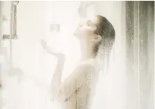  ??  ?? Hot showers can strip your skin of natural oils and make it feel drier.