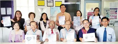  ??  ?? Henry (seated, third right), Joseph (seated, third left), Venitha (second right) and Richard (seated, right) at the Sabah 10K Run 2017 press conference at Wisma Sabata.