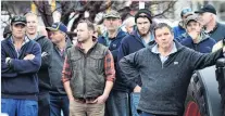  ?? PHOTO: CHRISTINE O’CONNOR ?? Groundswel­l supporters listen as Jock Allison addresses the crowd in Mosgiel.