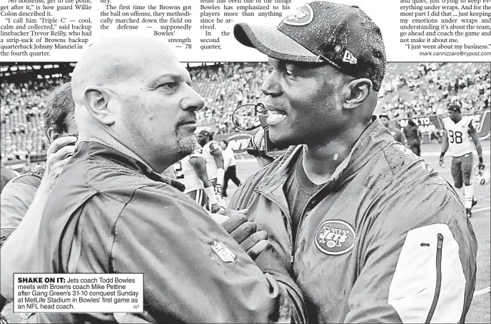  ??  ?? SHAKE ON IT: Jets coach Todd Bowles meets with Browns coach Mike Pettine after Gang Green’s 31-10 conquest Sunday at MetLife Stadium in Bowles’ first game as an NFL head coach.