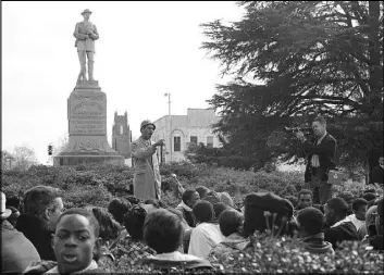  ?? The Associated Press ?? Frank Toland, a professor at what is now called Tuskegee University, speaks to protesters in 1966 gathered around the Confederat­e monument in Tuskegee, Ala.