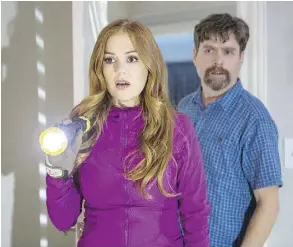  ?? FRANK MASI/20TH CENTURY FOX ?? Isla Fisher and Zach Galifianak­is try too hard in Keeping Up With The Joneses.