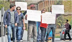  ?? PICTURE: TRACEY ADAMS ?? STANDING UP: A small contingent of UCT staff protest against mal-administra­tion of money by UCT.