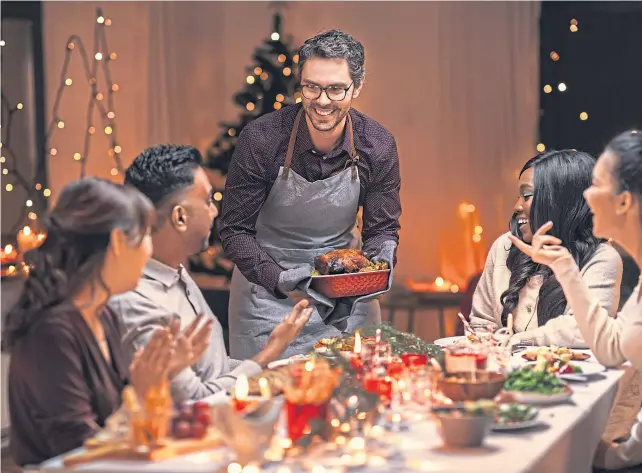  ?? ?? It’s the most wonderful meal of the year as Christmas Day dinner is served