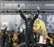  ?? WADE PAYNE — THE ASSOCIATED PRESS ?? Kurt Busch celebrates after winning the NASCAR Cup Series auto race for his sixth victory on Saturday night in Bristol, Tenn.