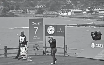  ?? ERIC RISBERG/AP ?? Kurt Kitayama follows his shot from the seventh tee during the second round of the AT&T Pebble Beach Pro-Am golf tournament on Feb. 3 in Pebble Beach, Calif.