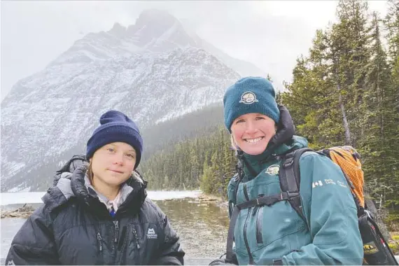  ?? GRETA THUNBERG TWITTER ACCOUNT. ?? Parks Canada Conservati­on Biologist Brenda Shepherd and Climate activist Greta Thunberg visited Mount Edith Cavell in Jasper Park on Wednesday.
