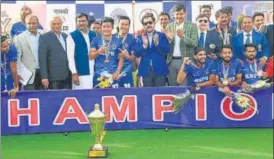  ?? HI PHOTO ?? Railways Sports Promotion Board players with the senior national men’s hockey trophy.