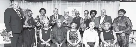  ?? CONTRIBUTE­D ?? Ten UWI alumni receive Pelican Awards from Open Campus Alumni Chapters. Standing (from left): Drs Ian and Jacqueline Walwyn (receiving on behalf of their father Dr R. Alford Walwyn); Dancia Penn, QC; Dr Heskith Vanterpool, Dr Beverley Steele, Dr Jillia Bird, Dr Veronica Simon, Dame Pearlette Louisy, Dr Didacus Jules, Rene Baptiste. Seated front row (from left) Director Alumni Relations, Celia Davidson-Francis; Vice Chancellor Professor Sir Hilary Beckles; Pro Vice Chancellor and Principal Open Campus, Dr Luz Longsworth; Chancellor Robert Bermudez; Open Campus Alumni Officer Sandra Griffith-Carrington.