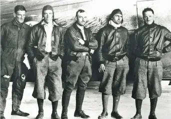  ??  ?? As cockpits were enclosed, the Army introduced the A-1 leather flying jacket; it was not only functional but also stylish enough to be worn when not flying. Here, in 1929, after setting the endurance record in Fokker C-2A Question Mark, the crew pose for the photograph­er. At the far right is future Lt. Gen. Carl “Tooey” Spaatz, who went on to command the 8th Air Force in Europe in WW II. (Photo courtesy of the National Air and Space Museum via the author)